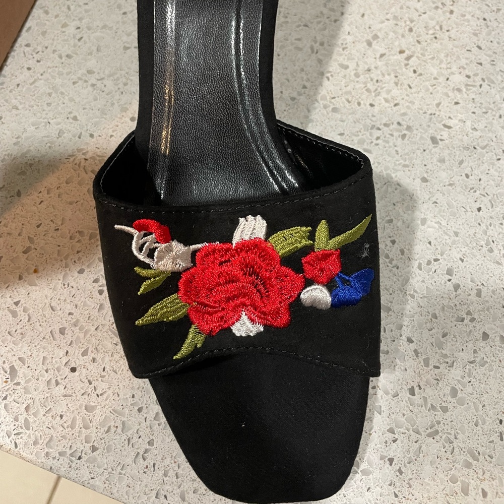 Embroidered flower black suede wedges